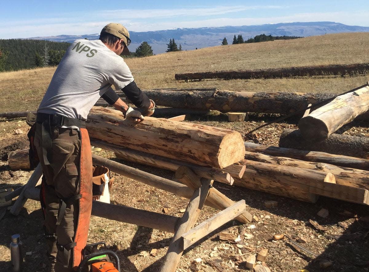 Josh Scheffler said he did a small amount of woodwork before becoming a ranger at Bighorn Canyon. Now he's repairing historic cabins.
