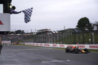 Red Bull driver Max Verstappen of the Netherlands crossed the finish line to win the Japanese Formula One Grand Prix at the Suzuka Circuit in Suzuka, central Japan, Sunday, Oct. 9, 2022. Verstappen secured second consecutive Formula One drivers' championship. (AP Photo/Toru Hanai, Pool)