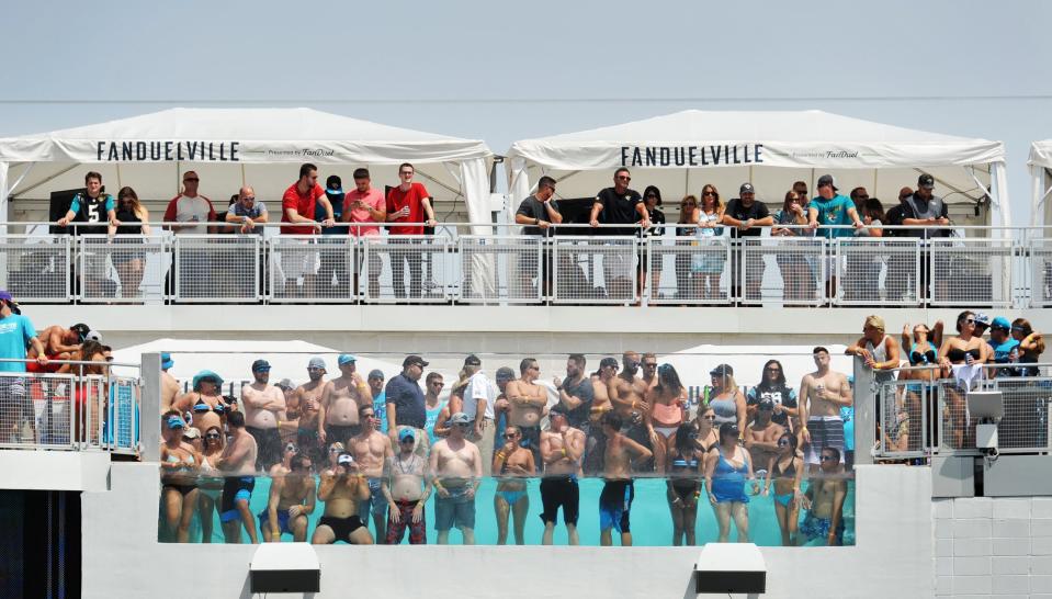Fans enjoy the pool and cabanas during the Jaguars game against the Carolina Panthers on Sunday, Sept. 13, 2015 at EverBank Field in Jacksonville, Florida.