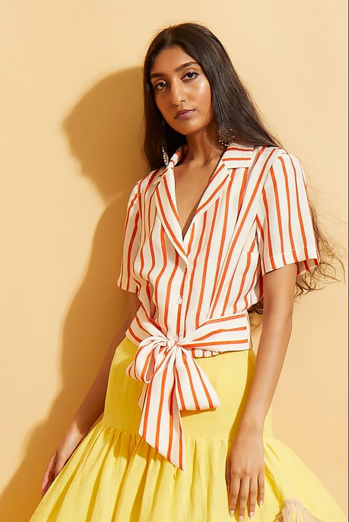 Get <a href="https://hopeforflowers.com/products/candy-stripe-tie-shirt" target="_blank" rel="noopener noreferrer">the Hope for Flowers by Tracy Reese candy-stripe tie-waist shirt for $178</a>