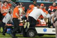 Miami Hurricanes safety Kamren Kinchens is taken off the field on a cart after an injury during the second half of an NCAA college football game against Texas A&M, Saturday, Sept. 9, 2023, in Miami Gardens, Fla. (AP Photo/Lynne Sladky)