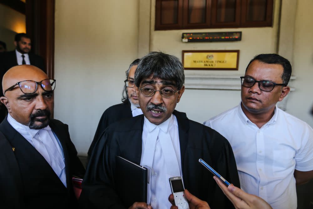 Lawyer Haniff Khatri Abdulla speaks to reporters at the Kuala Lumpur High Court October 29, 2019. — Picture by Firdaus Latif