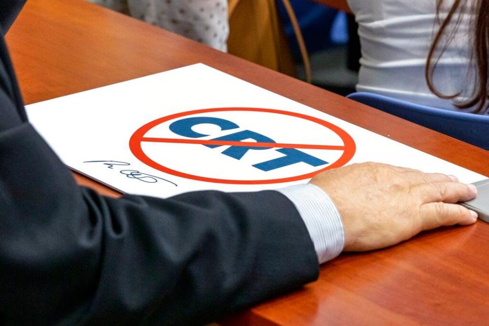 Florida Gov. Ron DeSantis publicly signs HB7, "individual freedom," also dubbed the "stop woke" bill, during a news conference at Mater Academy Charter Middle/High School in Hialeah Gardens on April 22, 2022.