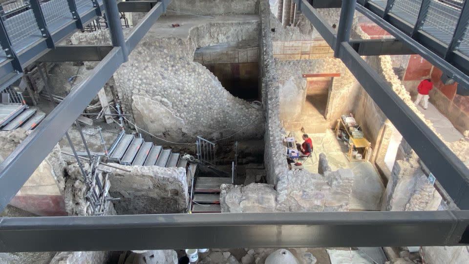 Visitors can look at the drawings from suspended walkways. - Archaeological Park of Pompeii