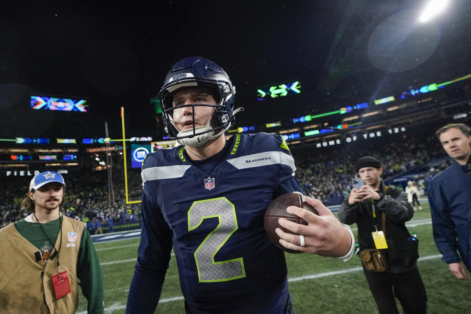 Seattle Seahawks quarterback Drew Lock walks on the field following an NFL football game against the Philadelphia Eagles, Monday, Dec. 18, 2023, in Seattle. The Seahawks won 20-17. (AP Photo/Lindsey Wasson)