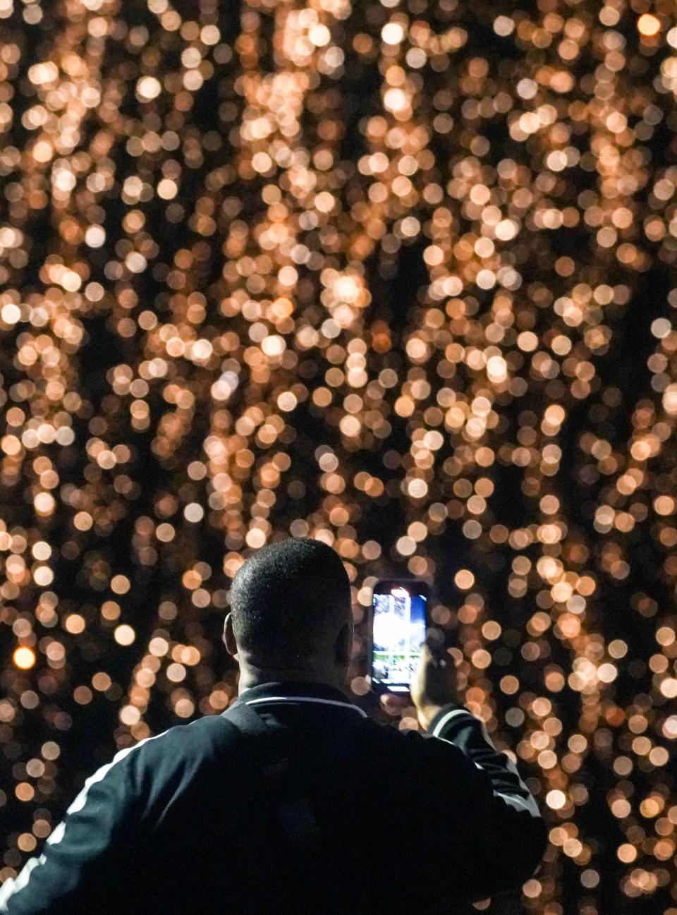 A man captures the fireworks on his cellphone prior to Three 6 Mafia headlining the UScellular Connection Stage for Summerfest on Thursday, June 22, 2023.