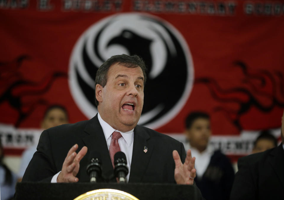 File-This Jan. 23, 2014, file photo shows New Jersey Gov. Chris Christie addressing a gathering at the Dudley Family School in Camden, N.J. Lawyers for a state legislative panel investigating a political payback scandal say a former aide to Gov. Christie has shown no valid legal reasons for refusing to comply with a subpoena. (AP Photo/Mel Evans, File)