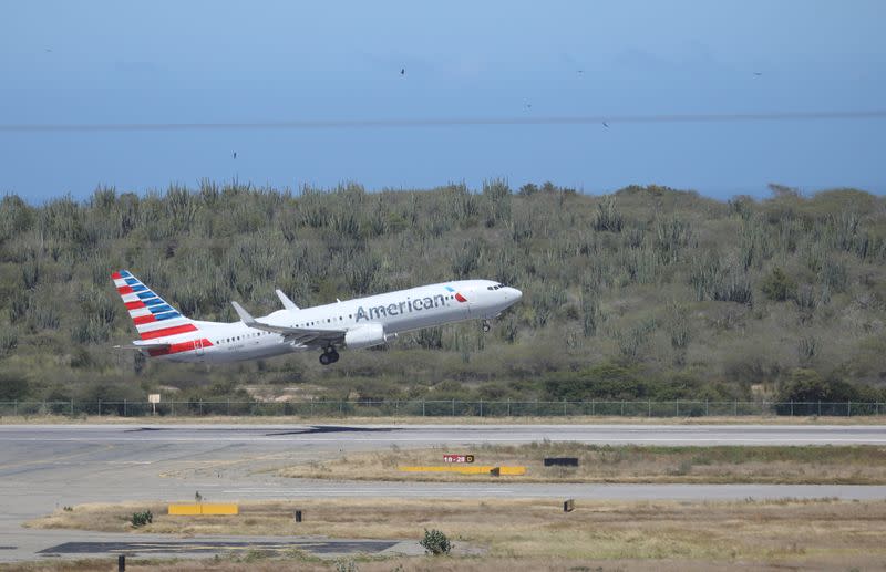 An American Airlines Boeing 737 airplane takes off at Simon Bolivar International Airport in Caracas