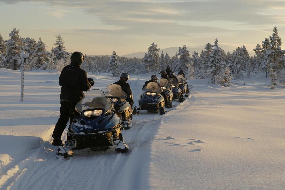 Snowshoeing and snowmobiling are often part of package holidays and guided tours to Lapland (Getty Images)