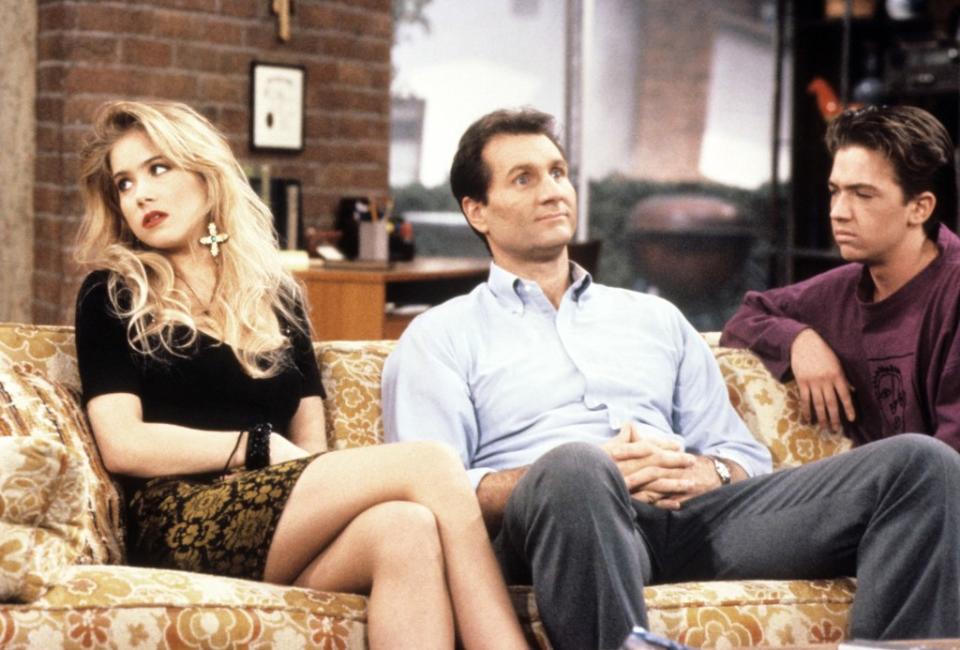Christina Applegate (from left), Ed O’Neill and David Faustino in a scene from “Married . . . With Children.” ©20thCentFox/Courtesy Everett Collection