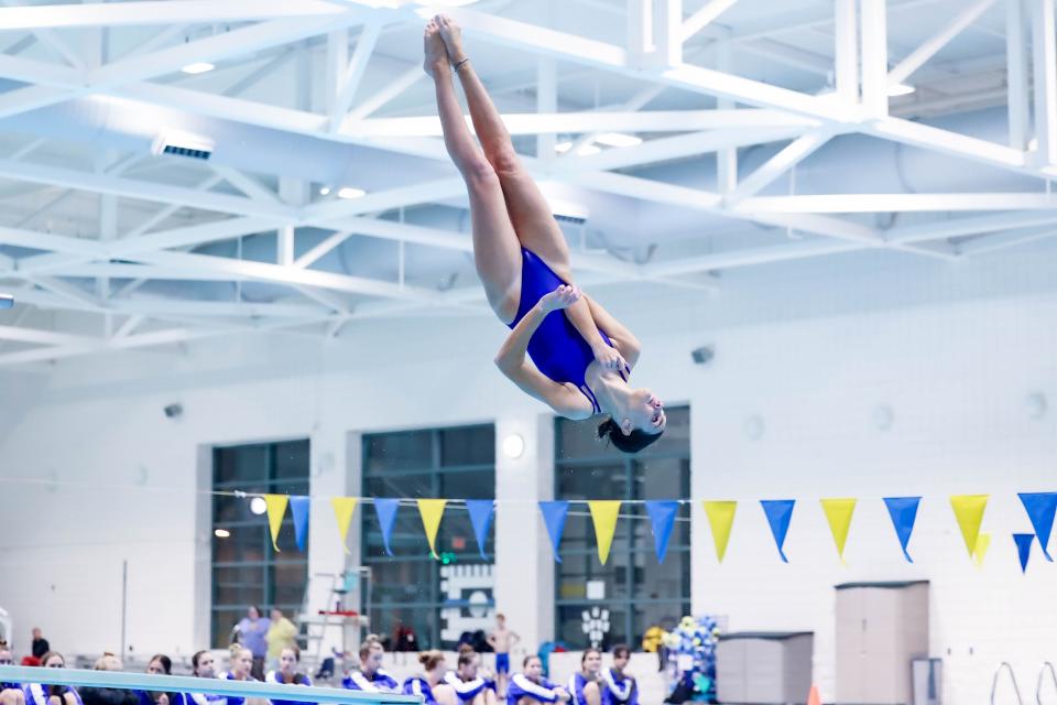 Wooster standout Colleen Frantz spirals towards the water on this dive.