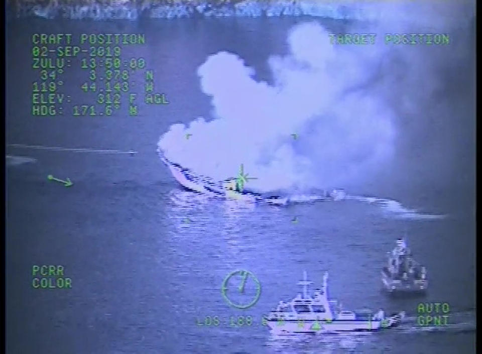 This Monday, Sept. 2, 2019, image from video released by the U.S. Coast Guard shows a Coast Guard Sector San Diego MH-60 Jayhawk helicopter video screen, as crew responds to the vessel "Conception" boat fire off Santa Cruz Island near Santa Barbara, Calif. Officials say no one likely escaped the flames that tore through a boat packed with scuba divers and the search for survivors has been called off. Authorities said Tuesday that no one has been found alive. Only five of crew members sleeping on the top deck were able to escape early Monday. (U.S. Coast Guard via AP)