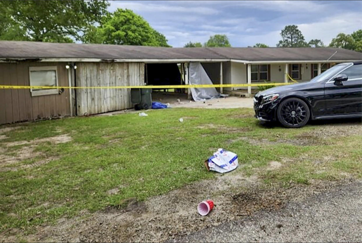 Image: Crime scene tape cordons off the scene of a shooting on April 23, 2023, in Jasper, Texas.  (Mike Lout / KJAS, Jasper, Texas via AP)