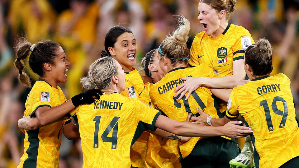 The Matildas celebrate after their penalty shootout win over France.