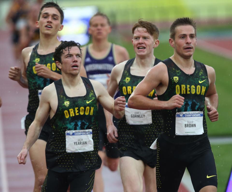Oregon's Reed Brown, right, wins his heat of the men's 1,500 meters ahead of teammates Elliott Cook, left, Jack Yearian and James Gormley during the first day of the Pac-12 Track & Field Championships at Hayward Field in Eugene, Oregon May 13, 2022.