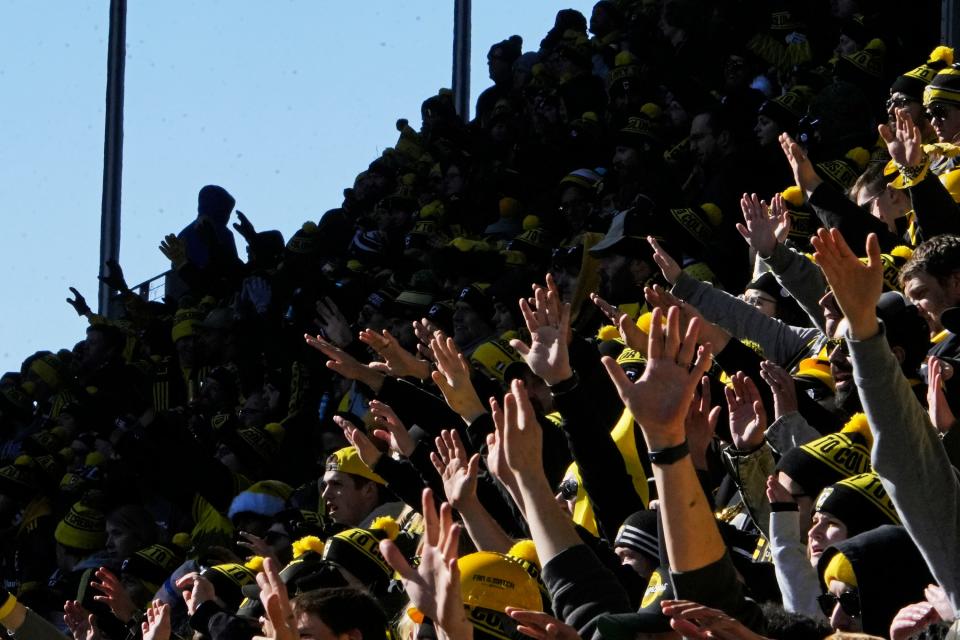 Crew supporters cheer during Columbus' 1-0 win over Atlanta United at Lower.com Field.