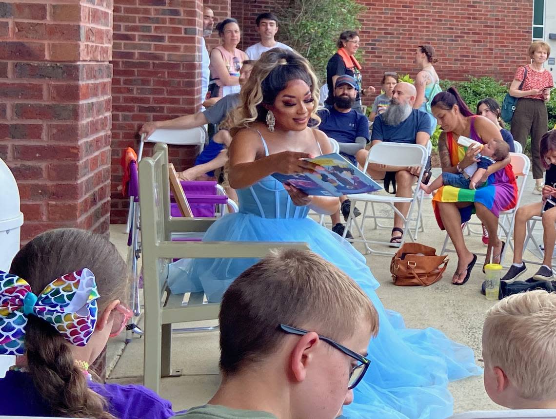 Drag performer Naomi Dix was dressed like a princess as she read Cinderelliot to children at the Pride Festival in Apex, NC.