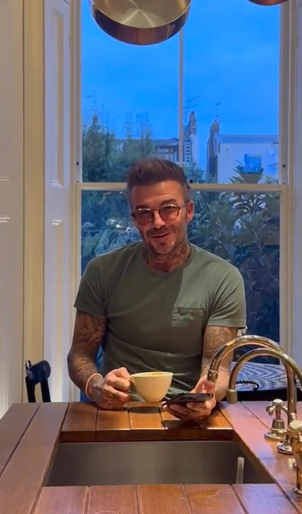 David Beckham singing along to Mariah Carey at home