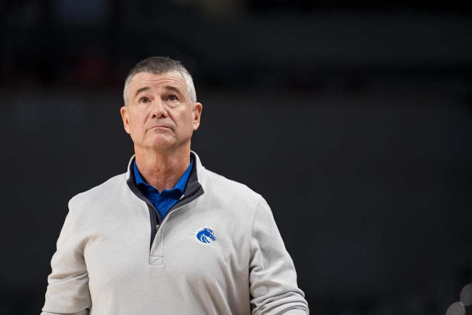 Boise State coach Leon Rice checks the clock during the second half of the team's NCAA college basketball game against Texas A&M in Fort Worth, Texas, Saturday, Dec. 3, 2022. (AP Photo/Emil Lippe)