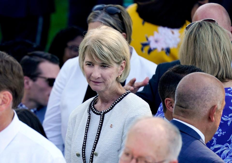 Ohio State University President Kristina Johnson, center, was among the dignitaries on the South Lawn of the White House for President Joe Biden's signing of the CHIPS and Science Act, which provides federal aid to Intel and other semiconductor manufacturers, on August 9, 2022, in Washington.