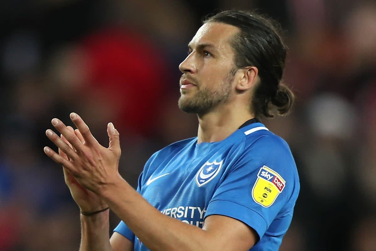 Christian Burgess has gone from League One to the Europa League quarter-finals in three years (Simon Cooper/PA) (PA Archive)