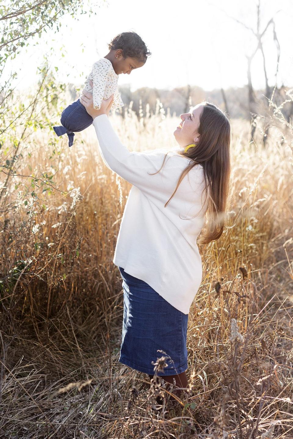 Jacqui McNeill holding baby Emilia