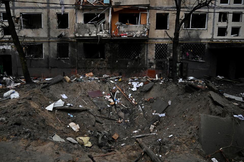 A crater from a Russian missile strike on Kyiv, 13 December 2023 (AFP via Getty Images)