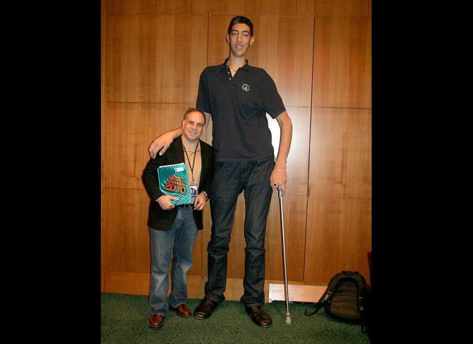 Sultan Kosen, the world's tallest man, with AOL Weird News editor Buck Wolf. At 8-foot-1, Kosen is the tallest man measured by Guinness World Records in more than two decades. 