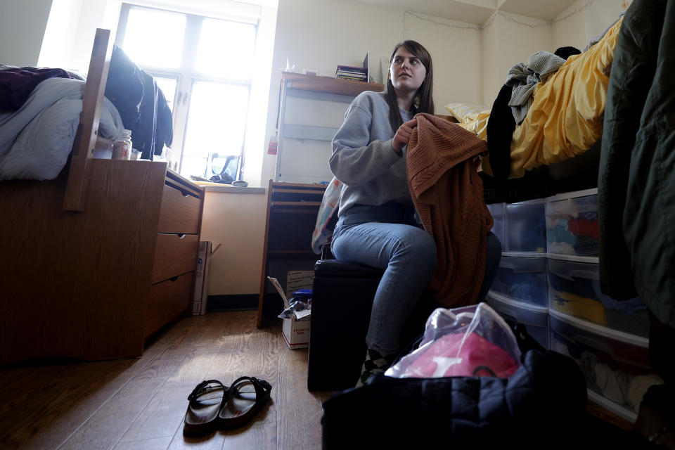 ANN ARBOR, MICHIGAN  - MARCH 17: Lizzy Anderson of White Pigeon Michigan packs up and moves out of her dorm at the University of Michigan on March 17, 2020 in Ann Arbor, Michigan. College students across America are being told to leave campus and continue classes online after the World Health Organization (WHO) declared Coronavirus (COVID-19) a pandemic. (Photo by Gregory Shamus/Getty Images)