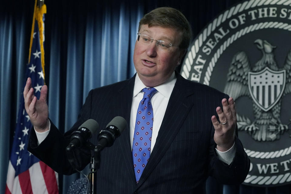 Gov. Tate Reeves answers a reporter's question.