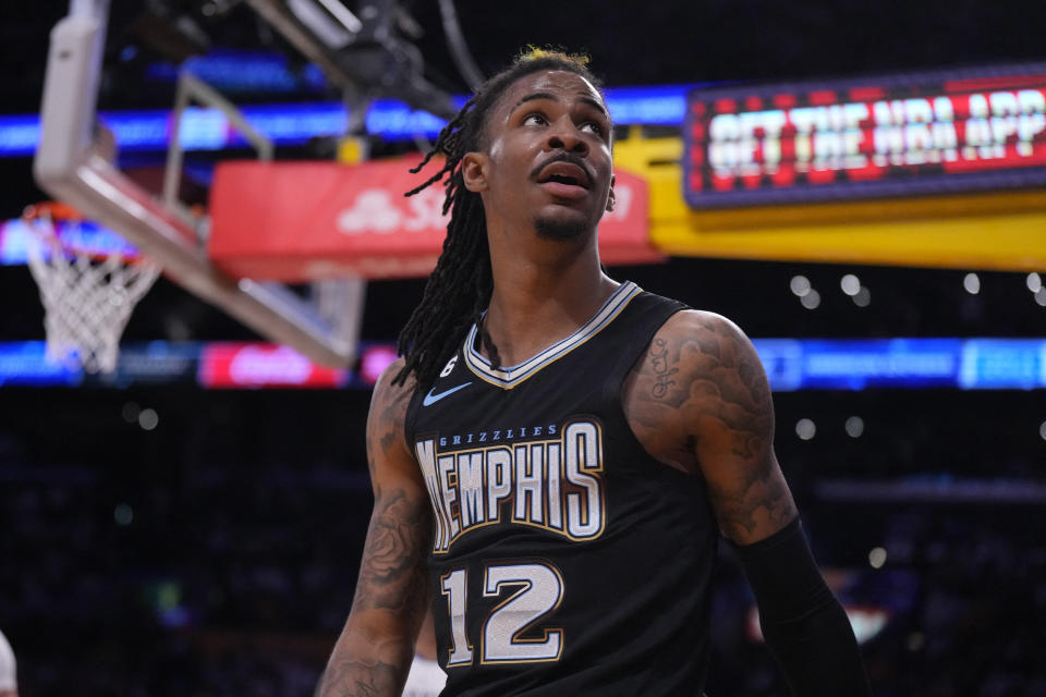 Apr 22, 2023; Los Angeles, California, USA; Memphis Grizzlies guard Ja Morant (12) reacts in the fourth quarter during game three of the 2023 NBA playoffs against the Los Angeles Lakers at Crypto.com Arena. Mandatory Credit: Kirby Lee-USA TODAY Sports