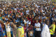 Worshippers gather at Ndolo airport for a Holy Mass with Pope Francis in Kinshasa, Congo, Wednesday, Feb. 1, 2023. Francis is in Congo and South Sudan for a six-day trip, hoping to bring comfort and encouragement to two countries that have been riven by poverty, conflicts and what he calls a "colonialist mentality" that has exploited Africa for centuries. (AP Photo/Jerome Delay)