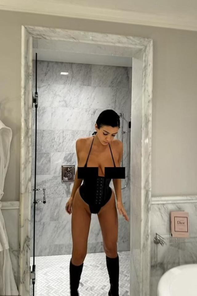 Bianca Censori flaunts her curves in a plunging bodysuit while out