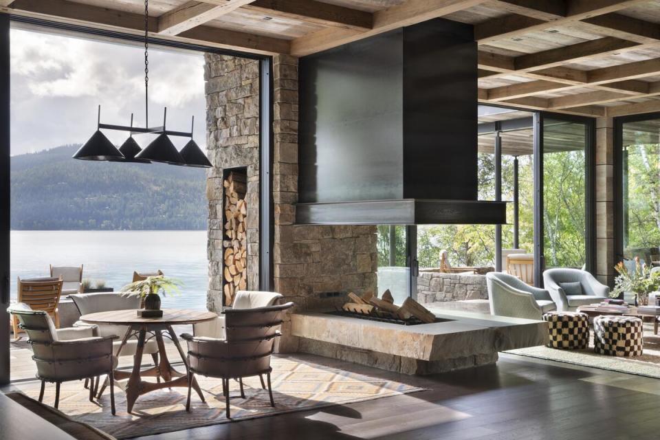 Indoor-outdoor spaces are a signature of Peter Dunham’s designs, as seen in this Montana lakefront property featuring an abundance of reclaimed natural materials, a palette of inviting neutral tones and plenty of pleasingly tactile fabrics