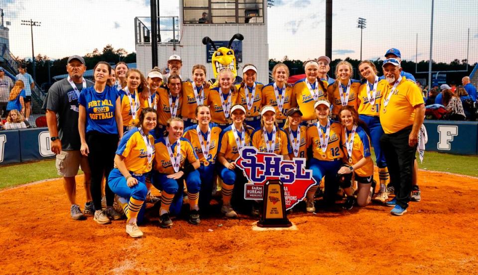 Fort Mill softball players celebrate winning class 5A softball championship against Lexington at Blythewood High on Friday, May 27, 2022.