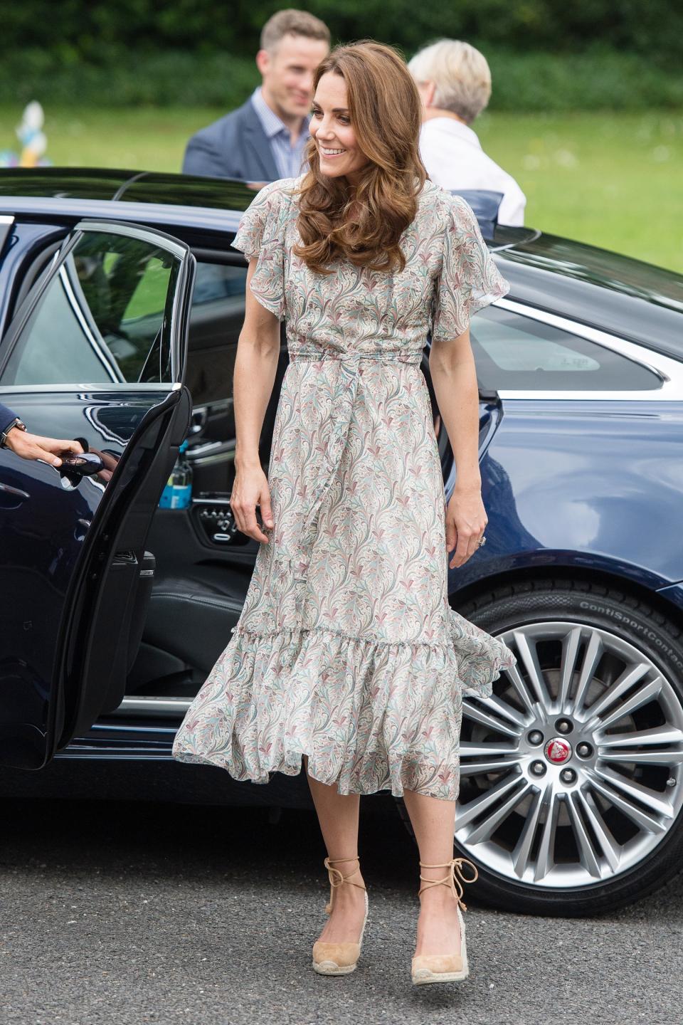 The Duchess of Cambridge <a href="https://people.com/royals/kate-middleton-photography-workshop-summer-dress/" rel="nofollow noopener" target="_blank" data-ylk="slk:attended a photography workshop;elm:context_link;itc:0;sec:content-canvas" class="link ">attended a photography workshop</a>, joined by young people from her patronage Action for Children, wearing a summery floral tiered dress and espadrille wedges. <strong>Get the Look!</strong> Faithfull the Brand Marta Wrap Dress, $189; <a href="https://click.linksynergy.com/deeplink?id=93xLBvPhAeE&mid=13867&murl=https%3A%2F%2Fwww.bloomingdales.com%2Fshop%2Fproduct%2Ffaithfull-the-brand-marta-wrap-dress%3FID%3D3340174&u1=PEO%2CShopping%3AEverythingYouNeedtoCopyKateMiddleton%E2%80%99sSummerStyle%2Ckamiphillips2%2CUnc%2CGal%2C7115494%2C201909%2CI" rel="nofollow noopener" target="_blank" data-ylk="slk:bloomingdales.com;elm:context_link;itc:0;sec:content-canvas" class="link ">bloomingdales.com</a> Gal Meets Glam Collection Cheryl Crossback Ruffle Maxi Dress, $198; <a href="https://click.linksynergy.com/deeplink?id=93xLBvPhAeE&mid=1237&murl=https%3A%2F%2Fshop.nordstrom.com%2Fs%2Fgal-meets-glam-collection-cheryl-crossback-ruffle-maxi-dress%2F5297621&u1=PEO%2CShopping%3AEverythingYouNeedtoCopyKateMiddleton%E2%80%99sSummerStyle%2Ckamiphillips2%2CUnc%2CGal%2C7115494%2C201909%2CI" rel="nofollow noopener" target="_blank" data-ylk="slk:nordstrom.com;elm:context_link;itc:0;sec:content-canvas" class="link ">nordstrom.com</a> House of Harlow 1960 x Revolve Cruz Maxi, $248; <a href="http://www.anrdoezrs.net/links/8029122/type/dlg/sid/PEO,Shopping:EverythingYouNeedtoCopyKateMiddleton’sSummerStyle,kamiphillips2,Unc,Gal,7115494,201909,I/https://www.revolve.com/house-of-harlow-1960-x-revolve-cruz-maxi/dp/HOOF-WD412/" rel="nofollow noopener" target="_blank" data-ylk="slk:revolve.com;elm:context_link;itc:0;sec:content-canvas" class="link ">revolve.com</a> Love Sam Talullah Embroidered Maxi Dress, $425; <a href="https://click.linksynergy.com/deeplink?id=93xLBvPhAeE&mid=42352&murl=https%3A%2F%2Fwww.shopbop.com%2Ftallulah-embroidery-maxi-dress-love%2Fvp%2Fv%3D1%2F1579094063.htm&u1=PEO%2CShopping%3AEverythingYouNeedtoCopyKateMiddleton%E2%80%99sSummerStyle%2Ckamiphillips2%2CUnc%2CGal%2C7115494%2C201909%2CI" rel="nofollow noopener" target="_blank" data-ylk="slk:shopbop.com;elm:context_link;itc:0;sec:content-canvas" class="link ">shopbop.com</a> Ramy Brook Printed Schena Dress, $545; <a href="https://click.linksynergy.com/deeplink?id=93xLBvPhAeE&mid=42352&murl=https%3A%2F%2Fwww.shopbop.com%2Fprinted-schena-dress-ramy-brook%2Fvp%2Fv%3D1%2F1548191565.htm&u1=PEO%2CShopping%3AEverythingYouNeedtoCopyKateMiddleton%E2%80%99sSummerStyle%2Ckamiphillips2%2CUnc%2CGal%2C7115494%2C201909%2CI" rel="nofollow noopener" target="_blank" data-ylk="slk:shopbop.com;elm:context_link;itc:0;sec:content-canvas" class="link ">shopbop.com</a> Rebecca Taylor Ikat Leaf Print Dress, $595; <a href="https://click.linksynergy.com/deeplink?id=93xLBvPhAeE&mid=13867&murl=https%3A%2F%2Fwww.bloomingdales.com%2Fshop%2Fproduct%2Frebecca-taylor-ikat-leaf-print-dress%3FID%3D3372426&u1=PEO%2CShopping%3AEverythingYouNeedtoCopyKateMiddleton%E2%80%99sSummerStyle%2Ckamiphillips2%2CUnc%2CGal%2C7115494%2C201909%2CI" rel="nofollow noopener" target="_blank" data-ylk="slk:bloomingdales.com;elm:context_link;itc:0;sec:content-canvas" class="link ">bloomingdales.com</a>