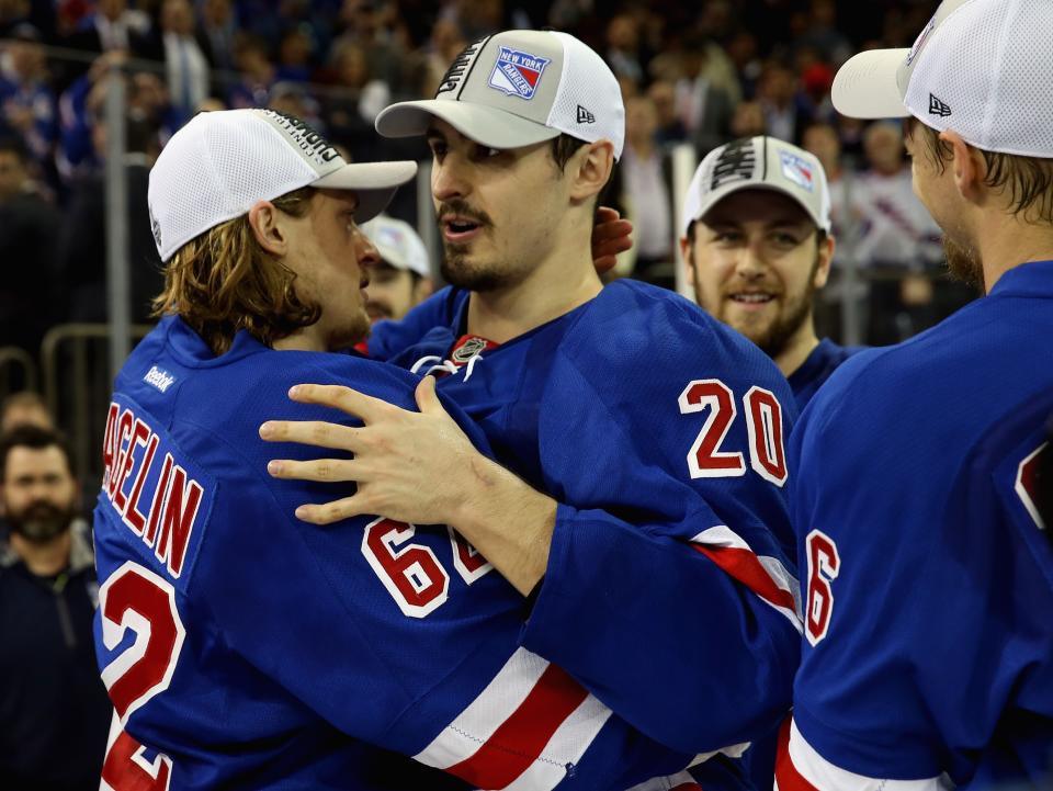 NEW YORK, NY - MAY 29: Carl Hagelin #62 and Chris Kreider #20 of the New York Rangers celebrates after defeating the Montreal Canadiens in Game Six to win the Eastern Conference Final in the 2014 NHL Stanley Cup Playoffs at Madison Square Garden on May 29, 2014 in New York City.Rangers defeated the Candiens 1-0. (Photo by Bruce Bennett/Getty Images)