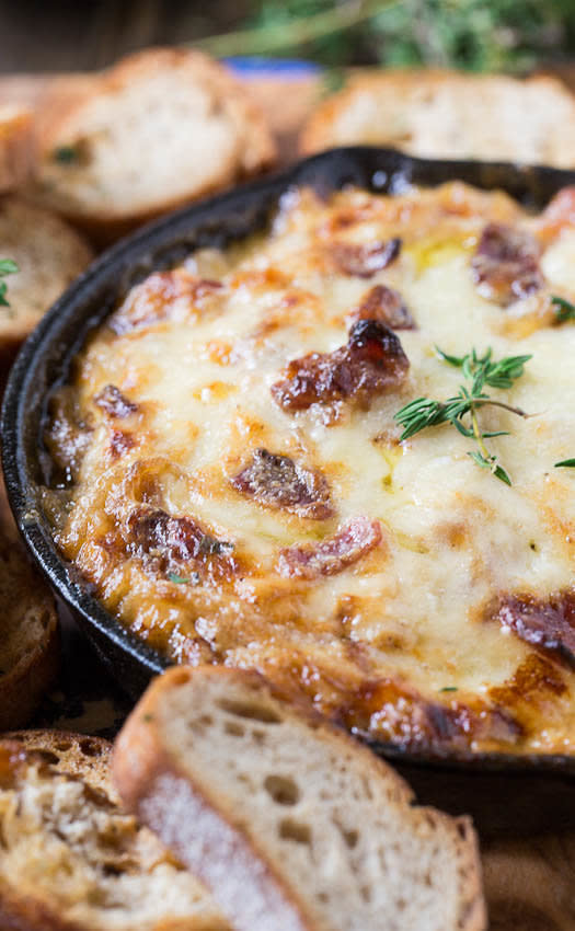 <strong>Get the <a href="http://spicysouthernkitchen.com/hot-caramelized-onion-dip-with-bacon-and-gruyere/" target="_blank">Hot Caramelized Onion Dip with Bacon and Gruyere recipe</a> from Spicy Southern Kitchen</strong>