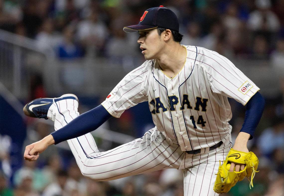 Japan starting pitcher Roki Sasaki (14) pitches against Mexico during the second inning of a semifinal game at the World Baseball Classic at loanDepot Park on Monday, March 20, 2023, in Miami, Fla.