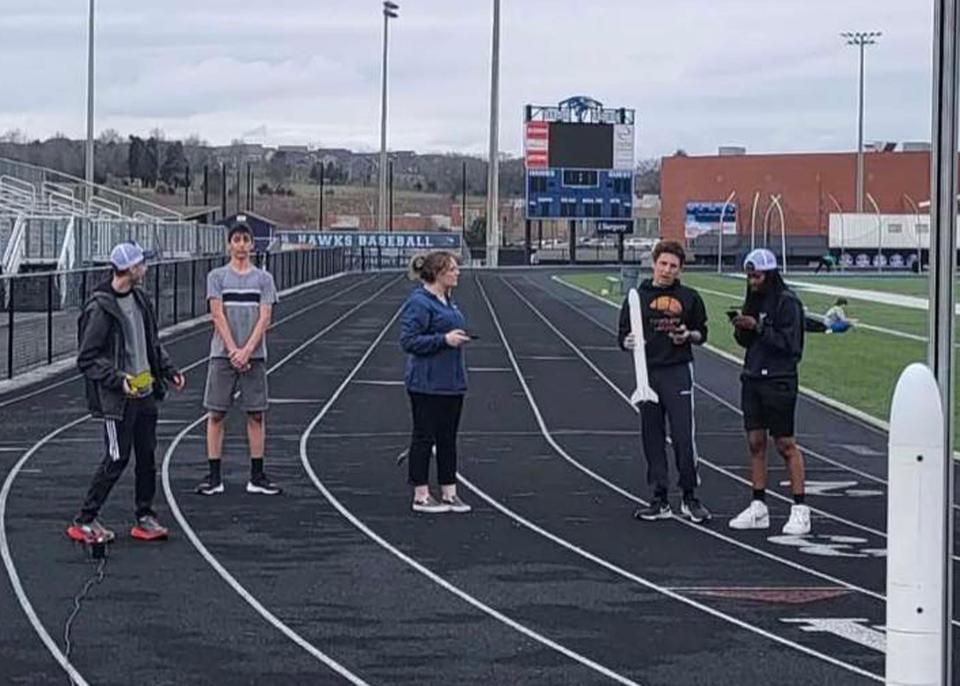 The AeroHAWKS team practices rocketry engineering challenges at Hardin Valley Academy track, Oct. 2022. From left: Branton Brunner, Adrian Alemar, Bailey Mounts, Zaen Grissino-Mayer, Mickey Dandena.