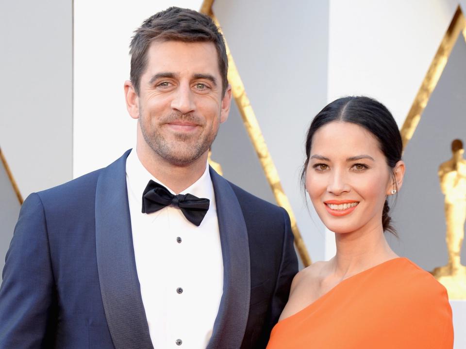 Olivia Munn (R) and NFL player Aaron Rodgers attend the 88th Annual Academy Awards at Hollywood & Highland Center on February 28, 2016 in Hollywood, California