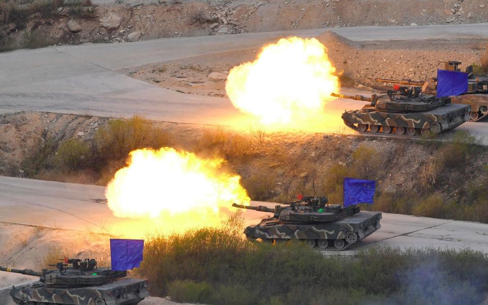 South Korean tanks fire in training drill - Credit: JUNG YEON-JE/AFP/Getty Images