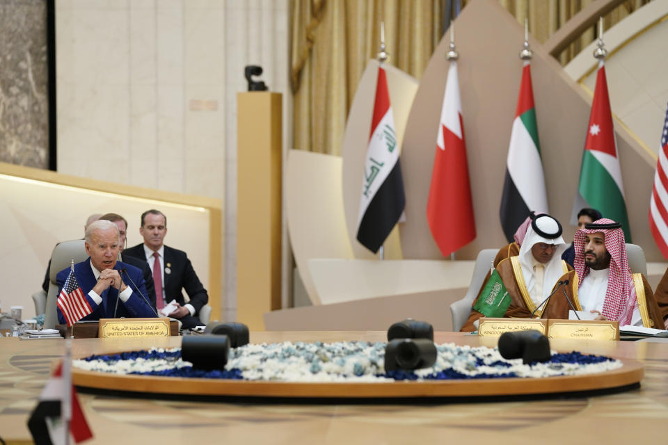 FILE - President Joe Biden and Saudi Crown Prince Mohammed bin Salman, far right, attend the Gulf Cooperation Council July 16, 2022, in Jeddah, Saudi Arabia. The Biden administration on Tuesday approved two massive arms sales to Saudi Arabia and the United Arab Emirates to help them defend against Iran. (AP Photo/Evan Vucci, File)