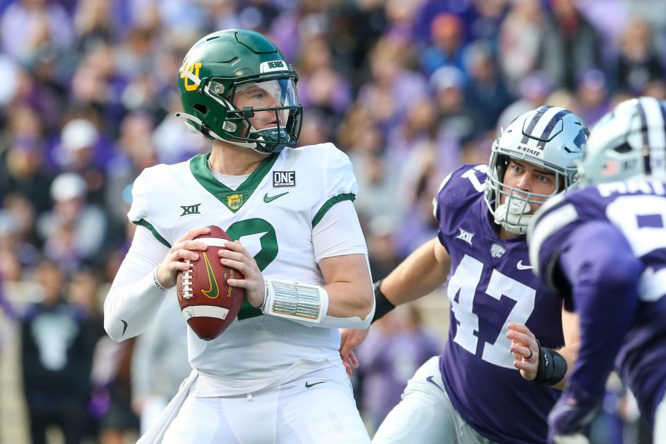 Kansas State defensive end Cody Stufflebean (47) puts pressure on Baylor quarterback Blake Shapen during last year's game at Bill Snyder Family Stadium.