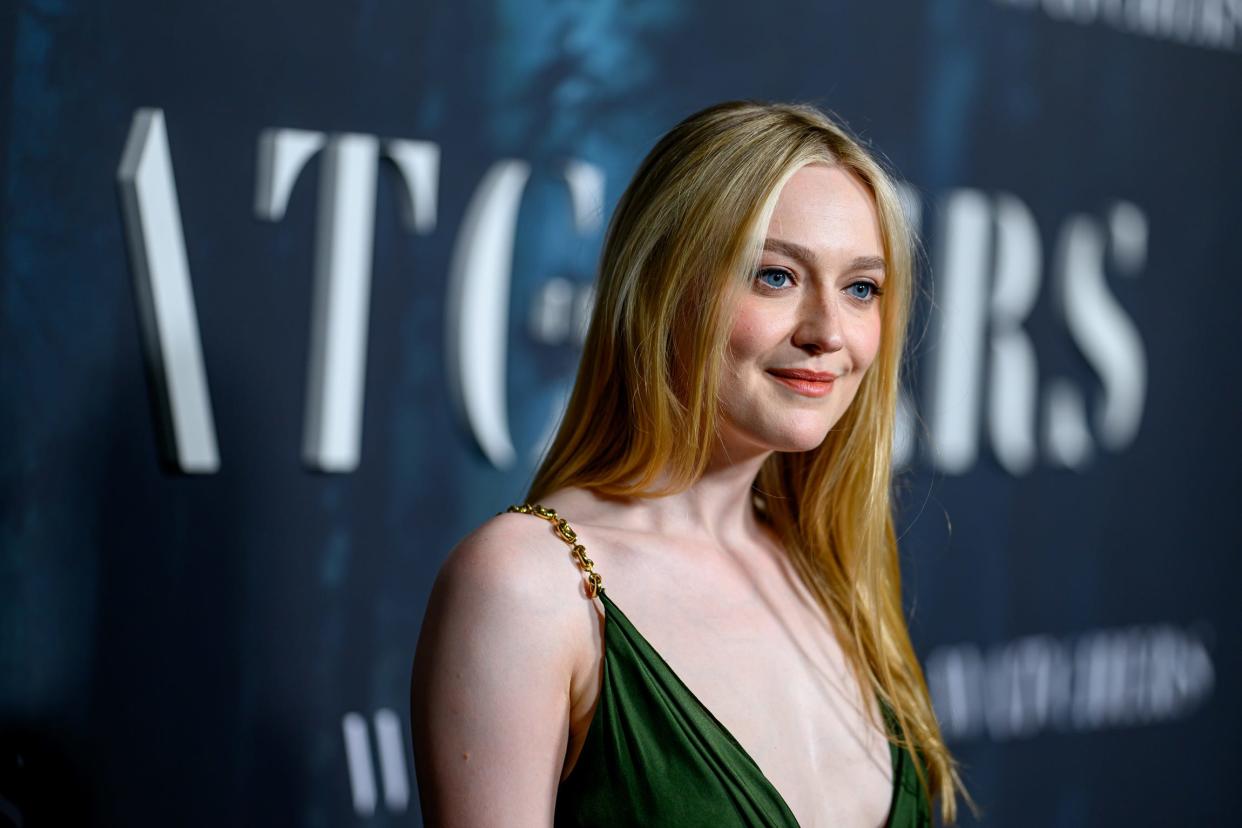 Dakota Fanning in a green dress