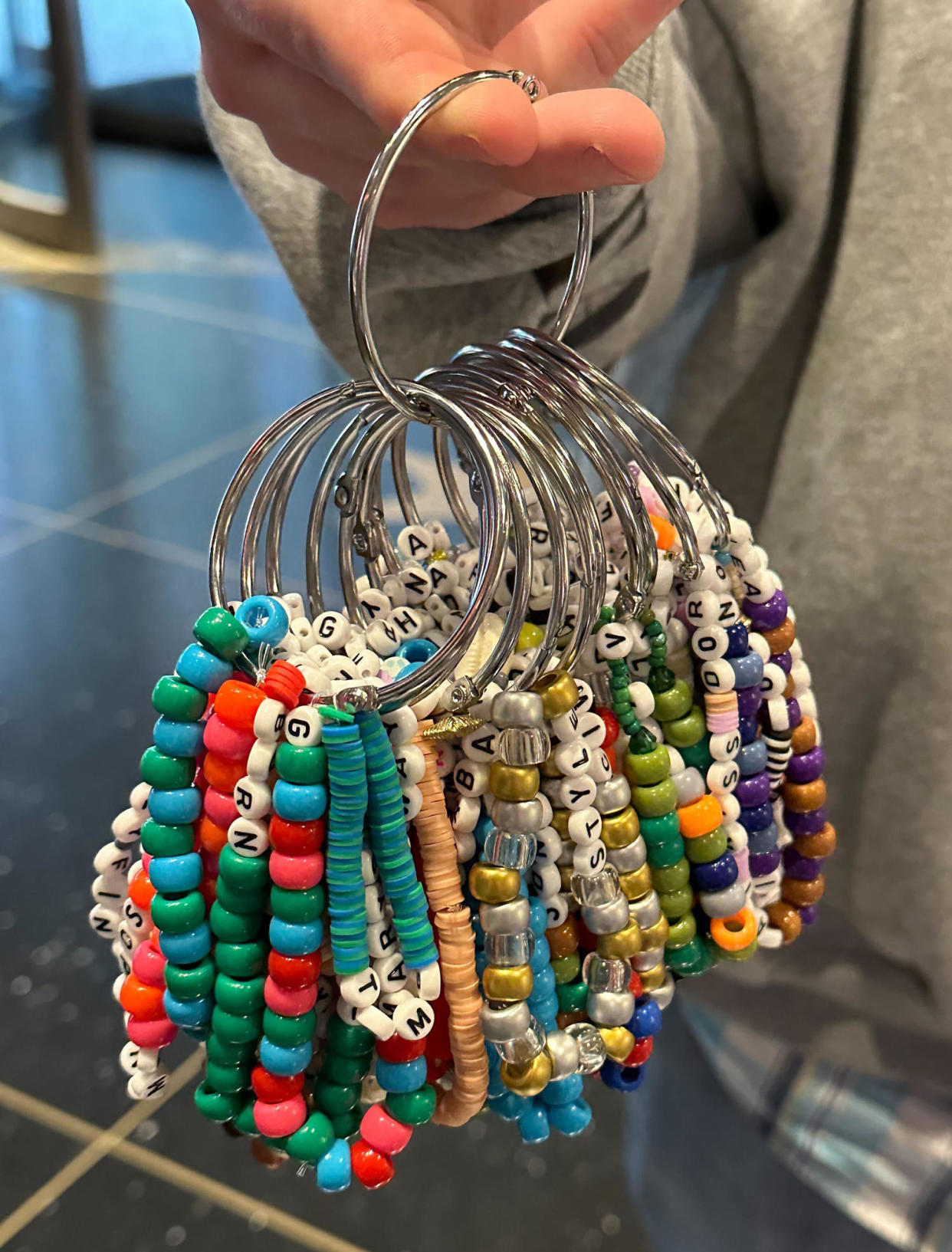 Image: Taylor Swift friendship bracelets on a large key ring. (Kaetlyn Liddy / NBC News)