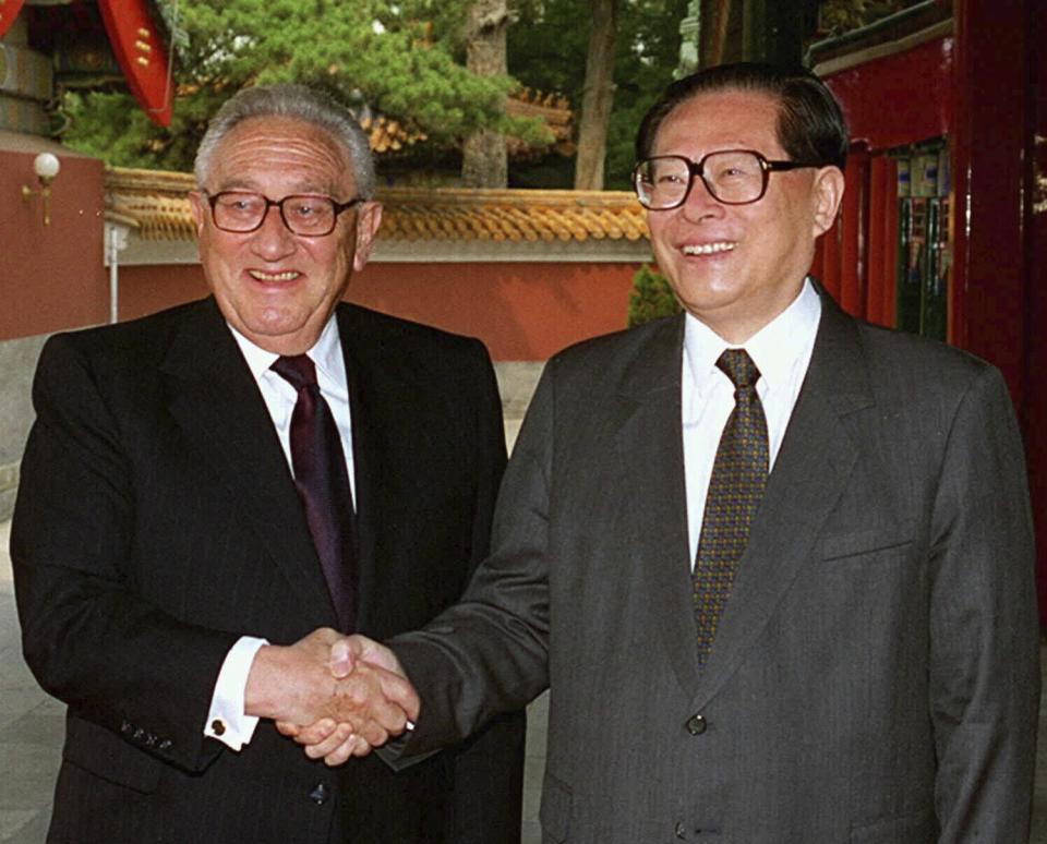 FILE - Former U.S. Secretary of State Henry Kissinger, left, poses with then Chinese President Jiang Zemin, right, in Beijing on Wednesday, June 18, 1997. Official China called Kissinger “an old friend.” A commentator likened him to a giant panda, a goodwill ambassador between two countries that have been more often at odds over the decades than not. Kissinger, who died Wednesday, Nov. 29, 2023, developed a special relationship with China in the second half of his 100-year-long life. (Liu Shao-Shan, Xinhua/ via AP Photo, File)