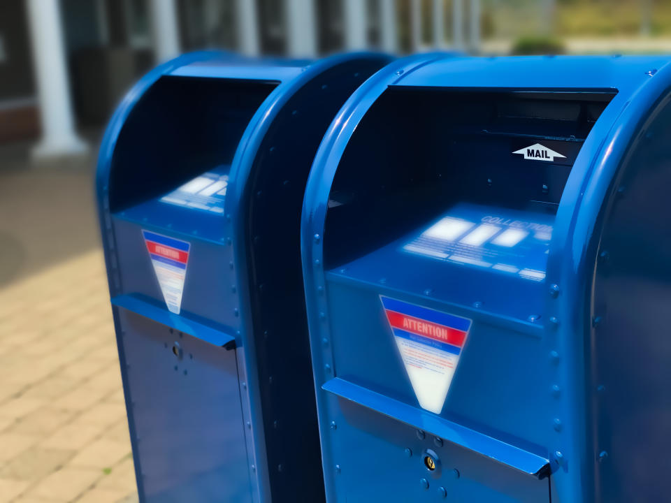 A US postal box. A woman sent her winning lottery ticket via mail, but it was lost and she cannot claim her prize.