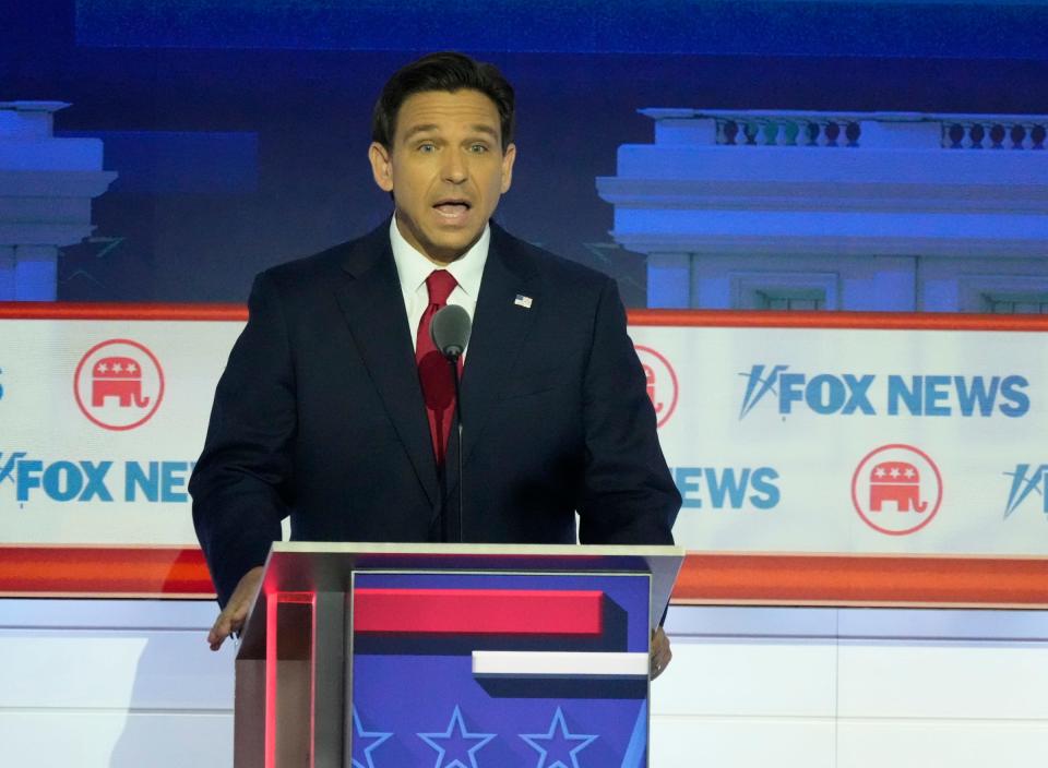 Republican presidential candidate Gov. Ron DeSantis answers a question at Fiserv Forum during the first 2023 GOP presidential debate in Milwaukee on Aug. 23.