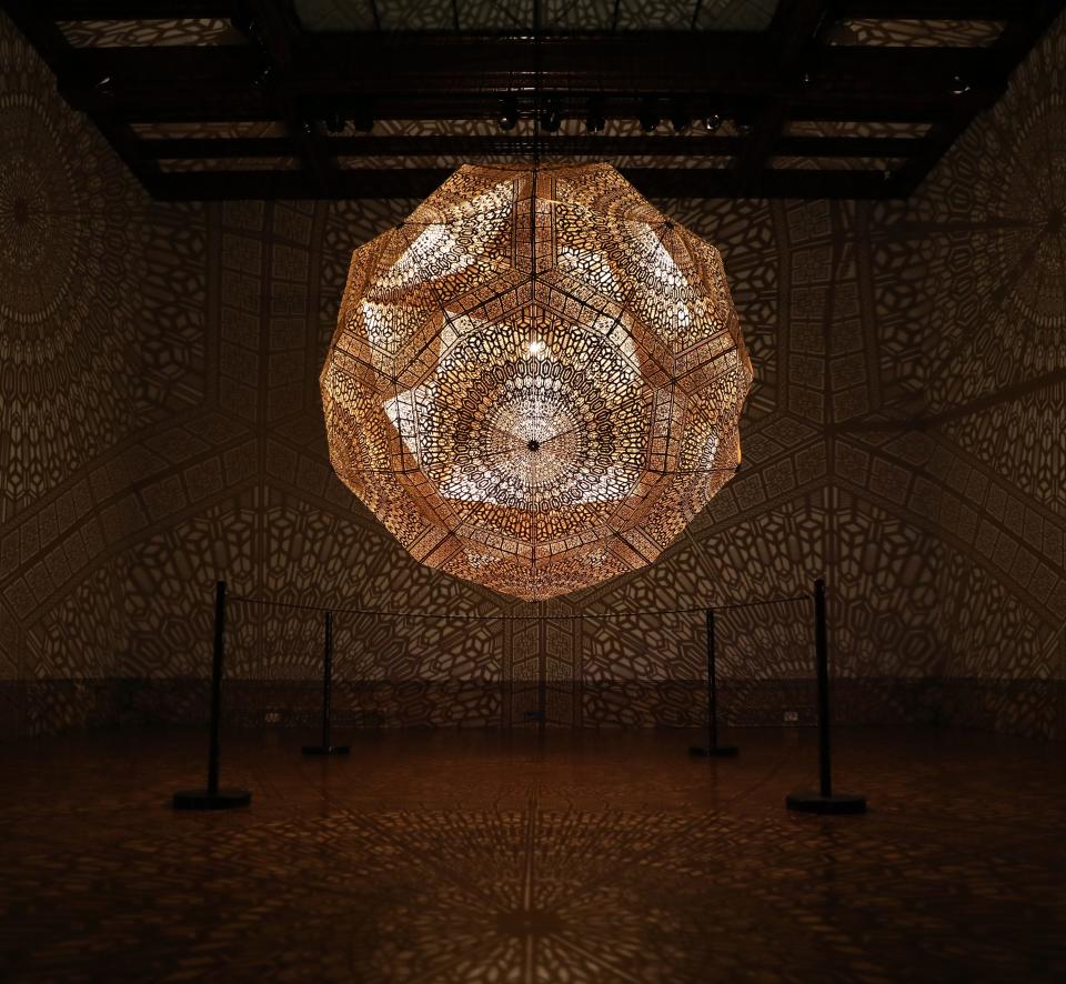 HYBYCOZO's newest piece, "Helios" is displayed Aug. 4, 2022, at The Paine Art Center and Gardens, 1410 Algoma Blvd., in Oshkosh. It is part of the exhibit, "The Nature of Light: An Exploration After Dark."